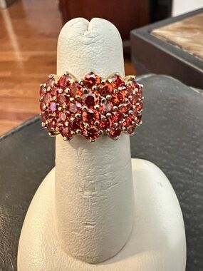 Women's Red Crystal Cluster Ring - Gold Tone I googled it.